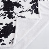 Elsa Cowhide Campfire Sherpa Throw Throw